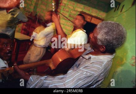 Musicien play traditional Morna or Cape Verde Fado in a Restaurant in the City Mindelo on the Island of Sao Pedro on the Cape Verde Islands in Africa. Stock Photo