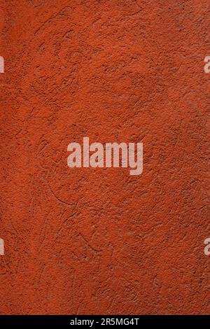 Decorative terracotta orange plaster texture on the wall - art brush stroke background Stock Photo
