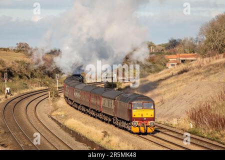 West Coast Railways Class 47 No. 47813 passes Standish Junction, Gloucestershire Stock Photo