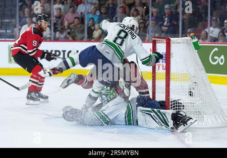 Seattle Thunderbirds' Bryce Pickford (8) Checks Quebec Remparts' Pier ...