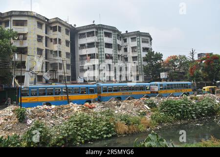 Kolkata, India. 04th June, 2023. Buses are parked beside the roadside garbage yard on the outskirts of Kolkata. (Photo by Sudipta Das/Pacific Press) Credit: Pacific Press Media Production Corp./Alamy Live News Stock Photo