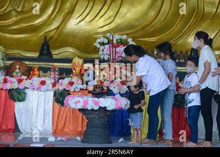 Bogor, West Java, Indonesia. 4th June, 2023. Buddhist devotees pour holy water over a baby Prince Siddhartha Gautama statue at the Buddha Dharma & 8 Pho Sat temple, in Bogor, West Java, Indonesia on June 4, 2023, as Buddha devotees celebrate Vesak day. Buddhists in Indonesia celebrated Vesak Day on Sunday to honour the birth, enlightenment, and death of Buddha more than 2,000 years ago. (Credit Image: © Adriana Adie/ZUMA Press Wire) EDITORIAL USAGE ONLY! Not for Commercial USAGE! Stock Photo