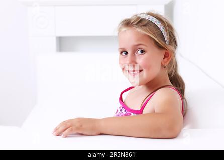 Portrait of cute girl smiling Stock Photo