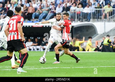 Madrid, Spain. 4th June, 2023. Karim Benzema (2nd R) of Real Madrid vies with Oscar de Marcos (1st R) of Bilbao during the Spanish La Liga football match between Real Madrid and Athletic Club Bilbao in Madrid, Spain, June 4, 2023. Credit: Gustavo Valiente/Xinhua/Alamy Live News Stock Photo