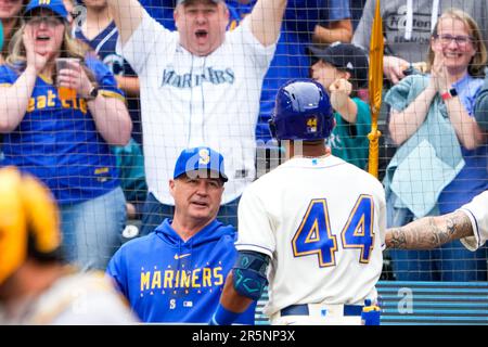 Seattle Mariners' Julio Rodriguez holds a trident in the dugout after  hitting a home run against the Oakland Athletics in a baseball game Monday,  Aug. 28, 2023, in Seattle. (AP Photo/Lindsey Wasson