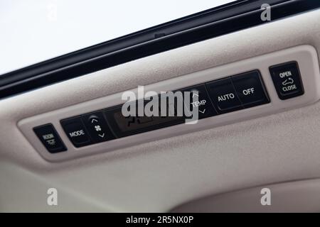 rear climate control panel on the ceiling for passengers Stock Photo