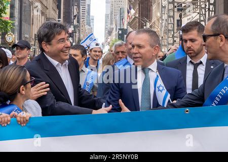 New York, United States. 04th June, 2023. NEW YORK, NEW YORK - JUNE 04: Israel's Minister of Science and Technology Ofir Akunis and Israel's ambassador to the UN Gilad Erdan march up Fifth Avenue during the Celebrate Israel Parade on June 4, 2023 in New York City. Credit: SOPA Images Limited/Alamy Live News Credit: SOPA Images Limited/Alamy Live News Stock Photo