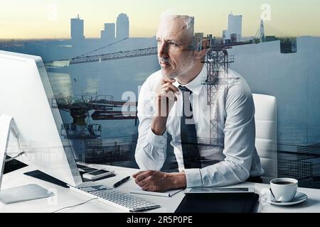 Building his business on a solid foundation. a handsome mature businessman superimposed over a construction site. Stock Photo