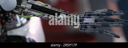Future technology in black prosthetic hand closeup. Robotics and creation of amechanical arm concept Stock Photo
