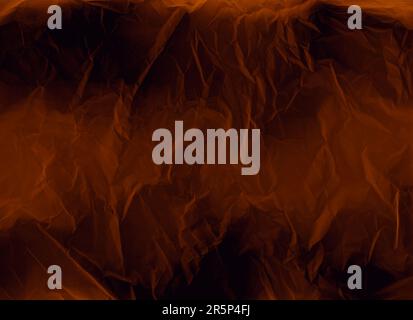 creased paper texture grunge overlay orange black Stock Photo