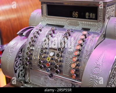 Details of Vintage Decorated and Silver-plated Cash Register. Stock Photo