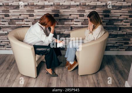Person Crying Console Thoughtful anxious woman listening sad music using smartphone crying ...