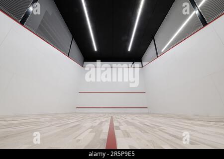 Brand New Modern Squash Court Wide Angle View Awaiting Players. Stock Photo