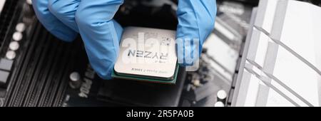 Tbilisi, Georgia - August 25, 2022: Closeup of AMD RYZEN processor on PC motherboard Stock Photo