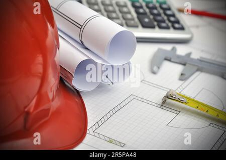 Workspace engineer, blueprint apartment  and tools on desktop Stock Photo