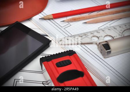 Blueprint, phone and tools on the desktop, workspace engineer Stock Photo