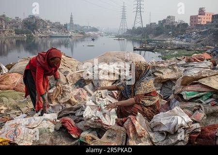 HEART-BREAKING images expose how women and children must work in a sea