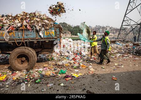 HEART-BREAKING images expose how women and children must work in a sea