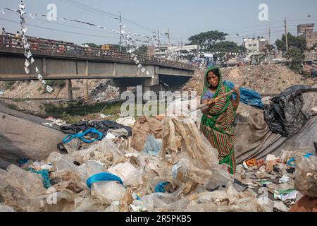 HEART-BREAKING images expose how women and children must work in a sea