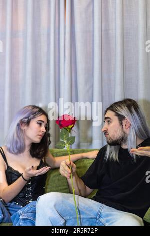 A young couple is enjoying a moment of togetherness in the comfort of their home Stock Photo