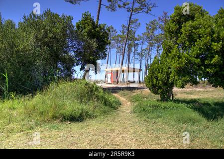 Quiaios, Portugal - August 14, 2022: Public bathroom and recreational facilities adjacent to lagoon called Lagoa das Bracas Stock Photo