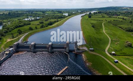 O'Brien's Bridge water dam, Clare Ireland -May,28, 2022,Parteen Weir in the headrace canal to Ardnacrusha Power Station Stock Photo