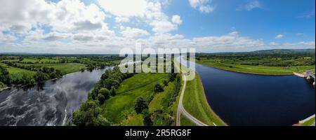 O'Brien's Bridge water dam, Clare Ireland -May,28, 2022,Parteen Weir in the headrace canal to Ardnacrusha Power Station Stock Photo