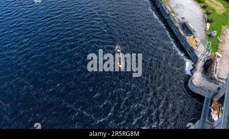 O'Brien's Bridge water dam, Clare Ireland -May,28, 2022,Parteen Weir in the headrace canal to Ardnacrusha Power Station Stock Photo