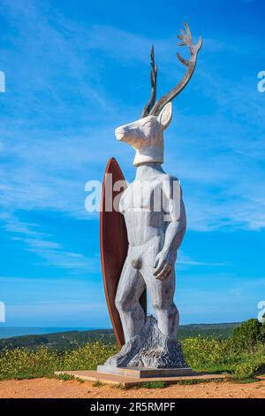 Portugal, Central region, Nazaré, Sitio district, statue in tribute to surfers and Our Lady of Nazareth, the deer's head alluding to the miracle of Our Lady of Nazareth Stock Photo