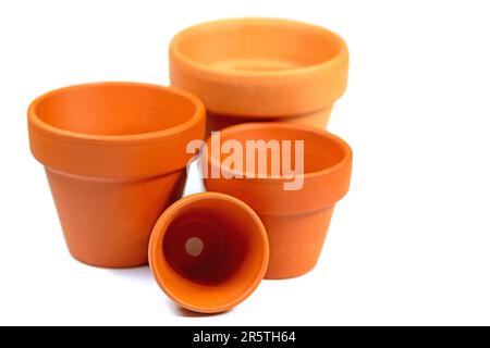 Empty flower pots isolated against white background Stock Photo - Alamy