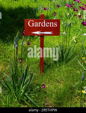 Sussex, UK - April 29th 2023: Signpost for the Gardens at the historic Arundel Castle in Arundel, West Sussex. Stock Photo