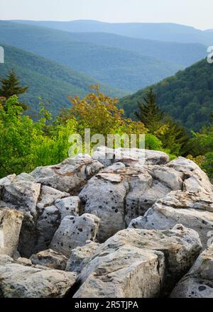 Boulders in foreground with green forests and distant mountains from from Lions Head, Dolly Sods Wilderness, West Virginia Stock Photo