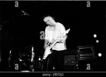 BOB MOULD, SUGAR, COPPER BLUE TOUR, 1992: Bob Mould from legendary grunge band Sugar on their Copper Blue Tour at Cardiff University on 17 December 1992. Photograph: Rob Watkins.  INFO: Sugar, an American alternative rock band formed in 1992 in Athens, Georgia, by Bob Mould, gained acclaim for their blend of punk energy and melodic hooks. Hits like 'If I Can't Change Your Mind' and 'Helpless' cemented their status as '90s indie rock icons. Stock Photo