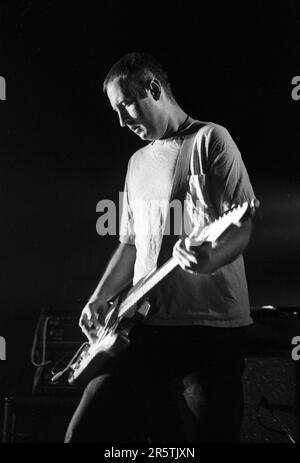 BOB MOULD, SUGAR, COPPER BLUE TOUR, 1992: Bob Mould from legendary grunge band Sugar on their Copper Blue Tour at Cardiff University on 17 December 1992. Photograph: Rob Watkins.  INFO: Sugar, an American alternative rock band formed in 1992 in Athens, Georgia, by Bob Mould, gained acclaim for their blend of punk energy and melodic hooks. Hits like 'If I Can't Change Your Mind' and 'Helpless' cemented their status as '90s indie rock icons. Stock Photo