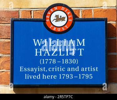 London, UK - April 20th 2023: A blue plaque on Long Acre in London, UK, marking where essayist, critic and artist William Hazlitt lived. Stock Photo