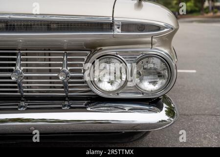 Classic car head lights are in perfect working condition on the front of this 1959 El Camino. Stock Photo