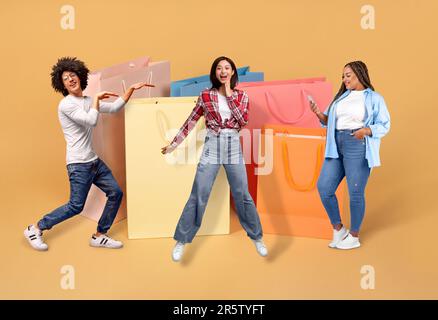 Positive multicultural millennials shopping during black friday, collage Stock Photo