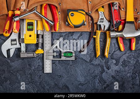Construction Toolbelt With Different Tools On Black Background Stock Photo