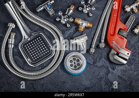 Bathroom Tools And Accessories On Black Stone Background Stock Photo