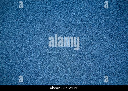 Furry blanket texture. Close-up of blue textile material, may be used as background. Stock Photo