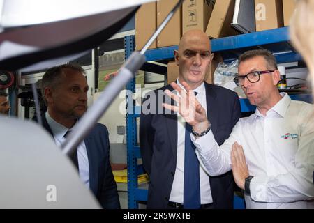 Venelles, France. 1st June, 2023. Roland Lescure (center) is seen during a visit to the GCK Group's Formula F company in Venelles, France. Roland Lescure, Minister Delegate for Industry, visits Solution F, a member of the GCK group, specializing in the development of carbon-free solutions based on hydrogen technology for transport, in Venelles, France. (Credit Image: © Laurent Coust/SOPA Images via ZUMA Press Wire) EDITORIAL USAGE ONLY! Not for Commercial USAGE! Stock Photo