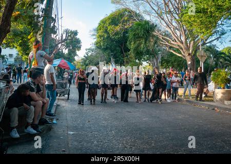 Barranquilla, Atlantico, Colombia - February 21 2023: Colombians Dressed in Black Clothes Parade in the Famous Carnival of Barranquilla Stock Photo