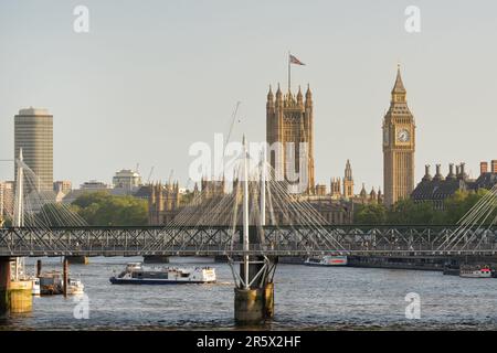 The Palace of Westminster is the meeting place of the Parliament of the United Kingdom and is located in London, England Stock Photo