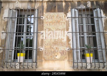 Old Property with Bars on Windows in Aix En Provence France Stock Photo