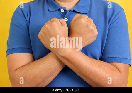 Hands of a Latino man makes sign language, expression and gesture-spatial configuration and visual perception with which deaf people Stock Photo