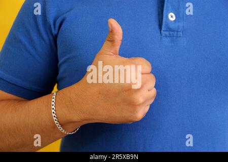 Hands of a Latino man makes sign language, expression and gesture-spatial configuration and visual perception with which deaf people Stock Photo