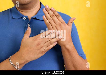 Hands of a Latino man makes sign language, expression and gesture-spatial configuration and visual perception with which deaf people Stock Photo