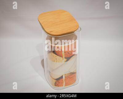 Wooden Lid Jars offer a natural and rustic storage solution that blends in well. These jars come with wooden lids that help to keep the contents fresh Stock Photo
