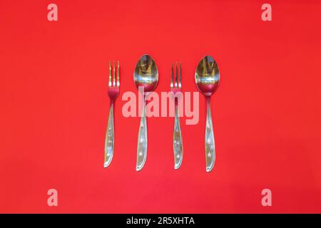 The Stainless Steel Spoon and Fork Set is a versatile and durable utensil set perfect for everyday dining or special occasions. Stock Photo