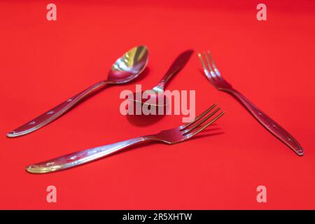 The Stainless Steel Spoon and Fork Set is a versatile and durable utensil set perfect for everyday dining or special occasions. Stock Photo